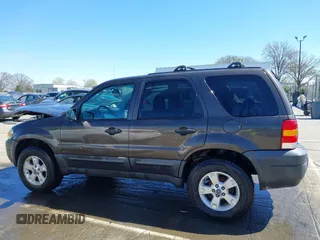 2006 Ford Escape XLT with VIN 1FMCU03116KB57387, listed as a IAAI auction lot 41813041 with 180,417 mi miles. Bid and sale history available at carsss.com. Image 15.