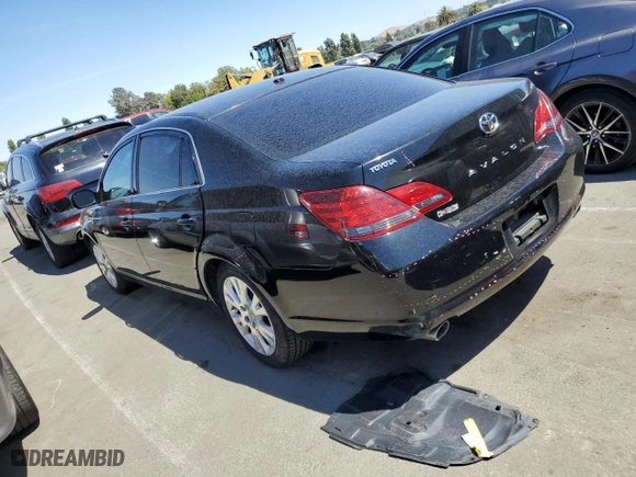 2010 Toyota Avalon XL with VIN 4T1BK3DB0AU358074, listed as a Copart auction lot 68949064 with 144,429 mi miles and Salvage Title. Bid and sale history available at carsss.com. Image 2.