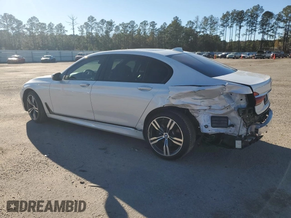 2019 BMW 7 Series 750i with VIN WBA7F0C5XKGM25897, listed as a Copart auction lot 86758004 with 68,700 mi miles and Salvage title. Bid and sale history available at DreamBid. Image 2.