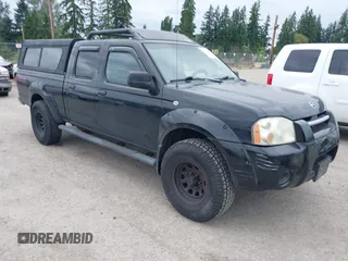 2003 Nissan Frontier XE z VIN 1N6ED29Y23C415075, wystawiony jako IAAI lot #42517910 z przebiegiem 156 084 mil mil oraz . Historia ofert i sprzedaży dostępna na DreamBid. Obrazek 1.
