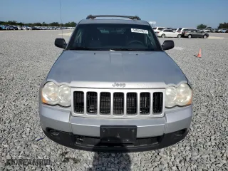 2009 Jeep Grand Cherokee Laredo with VIN 1J8GR48K09C551423, listed as a Copart auction lot 54094465 with 163,263 mi miles and Clean Title. Bid and sale history available at carsss.com. Image 5.