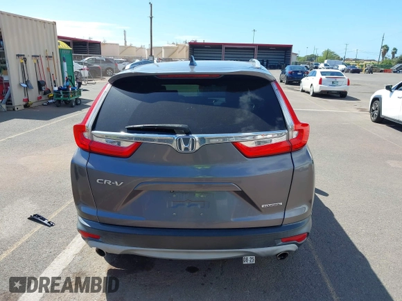 2018 Honda CR-V Touring with VIN 7FARW1H90JE030766, listed as a IAAI auction lot 41637900 with Not Provided miles and . Bid and sale history available at DreamBid. Image 16.