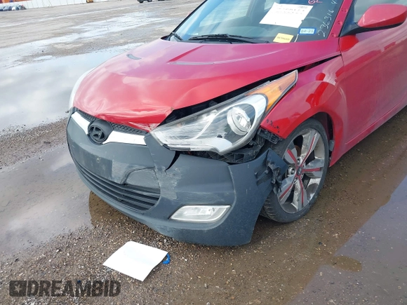 2015 Hyundai Veloster z VIN KMHTC6AD8FU227474, wystawiony jako IAAI lot #42188164 z przebiegiem 122 485 mil mil oraz . Historia ofert i sprzedaży dostępna na DreamBid. Obrazek 6.