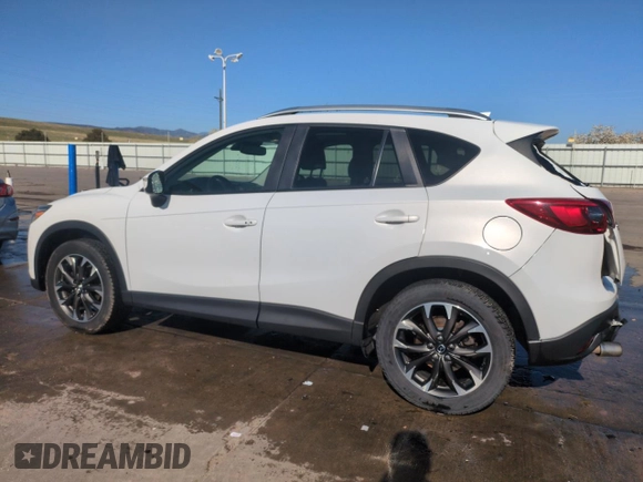 2016 Mazda CX-5 Grand Touring with VIN JM3KE4DY8G0671256, listed as a Copart auction lot 52920975 with 87,822 mi miles and Non Repairable. Bid and sale history available at carsss.com. Image 2.