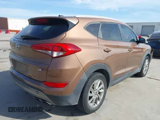 2016 Hyundai Tucson Limited with VIN KM8J33A20GU137662, listed as a IAAI auction lot 41818149 with 120,010 mi miles. Bid and sale history available at carsss.com. Image 4.