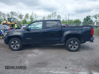 2018 Chevrolet Colorado 4WD Work Truck z VIN 1GCGTBEN9J1206595, wystawiony jako IAAI lot #42150736 z przebiegiem 176 880 mil mil oraz . Historia ofert i sprzedaży dostępna na DreamBid. Obrazek 14.