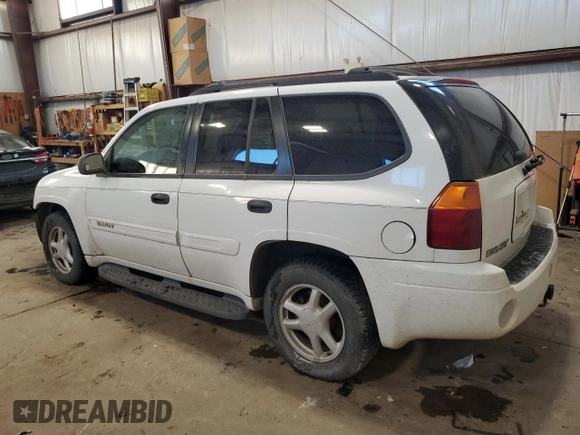 2004 GMC Envoy SLT with VIN 1GKDT13S042257444, listed as a Copart auction lot 89137605 with 301,920 mi miles and Salvage Title. Bid and sale history available at carsss.com. Image 2.