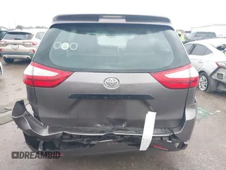 2015 Toyota Sienna L with VIN 5TDZK3DC9FS563593, listed as a IAAI auction lot 41466419 with 136,394 mi miles and . Bid and sale history available at DreamBid. Image 16.
