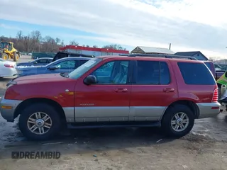 2002 Mercury Mountaineer Convenience z VIN 4M2ZU86W12ZJ16791, wystawiony jako IAAI lot #41749193 z przebiegiem 167 878 mil mil oraz . Historia ofert i sprzedaży dostępna na DreamBid. Obrazek 14.