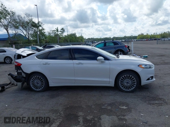 2016 Ford Fusion Titanium with VIN 3FA6P0K96GR400436, listed as a IAAI auction lot 42191256 with 128,447 mi miles and . Bid and sale history available at DreamBid. Image 13.