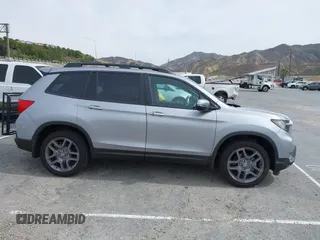 2023 Honda Passport EX-L with VIN 5FNYF8H53PB034963, listed as a IAAI auction lot 41686154 with 12,572 mi miles and . Bid and sale history available at carsss.com. Image 13.
