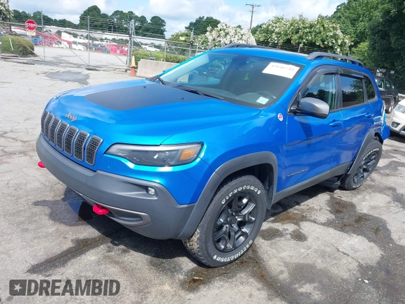 2019 Jeep Cherokee Trailhawk z VIN 1C4PJMBX1KD336247, wystawiony jako IAAI lot #42646549 z przebiegiem 61 636 mil mil oraz . Historia ofert i sprzedaży dostępna na DreamBid. Obrazek 18.