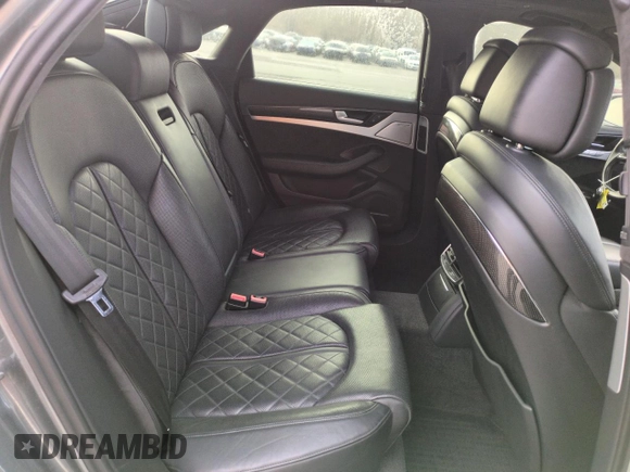 2015 Audi S8 с VIN WAUK2AFDXFN017156, выставлен на аукционе Copart как лот 50602605 с пробегом 100 224 миль миль и Списание • Salvage title. История ставок и продаж доступна на DreamBid. Изображение 10.