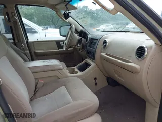 2004 Ford Expedition Special Service with VIN 1FMPU16L24LA37285, listed as a IAAI auction lot 41865431 with 244,616 mi miles. Bid and sale history available at carsss.com. Image 5.