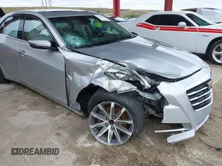 2016 Cadillac CTS Luxury Collection RWD z VIN 1G6AR5SXXG0128843, wystawiony jako IAAI lot #41404946 z przebiegiem 80 234 mil mil oraz . Historia ofert i sprzedaży dostępna na DreamBid. Obrazek 6.