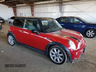 2003 MINI Hardtop S with VIN WMWRE33423TD59829, listed as a Copart auction lot 51691785 with 124,612 mi miles and Salvage Title. Bid and sale history available at DreamBid. Image 4.