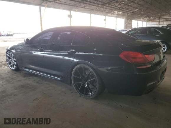 2014 BMW 6 Series 650i z VIN WBA6B2C56ED129901, wystawiony jako Copart lot #41619755 z przebiegiem 131 208 mil mil oraz Czysty tytuł • Clean title. Historia ofert i sprzedaży dostępna na DreamBid. Obrazek 2.