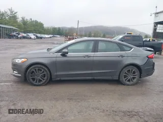 2018 Ford Fusion SE with VIN 3FA6P0H92JR258763, listed as a IAAI auction lot 42000848 with 101,344 mi miles and . Bid and sale history available at carsss.com. Image 14.