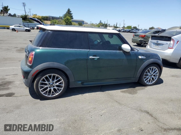 2009 MINI Hardtop S with VIN WMWMF73599TT96423, listed as a Copart auction lot 63913415 with 103,165 mi miles and Clean title. Bid and sale history available at DreamBid. Image 3.
