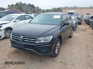 2018 Volkswagen Tiguan S with VIN 3VV0B7AX4JM098495, listed as a IAAI auction lot 41937757 with 179,168 mi miles and . Bid and sale history available at DreamBid. Image 2.
