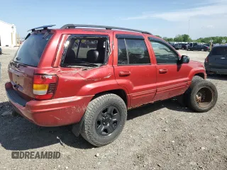 2002 Jeep Grand Cherokee Limited with VIN 1J4GW58N82C182603, listed as a Copart auction lot 57464295 with 240,179 mi miles and Salvage title. Bid and sale history available at DreamBid. Image 3.