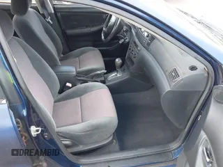 2004 Toyota Corolla CE z VIN 1NXBR32E04Z318381, wystawiony jako IAAI lot #41785932 z przebiegiem Nie podano mil oraz . Historia ofert i sprzedaży dostępna na DreamBid. Obrazek 5.