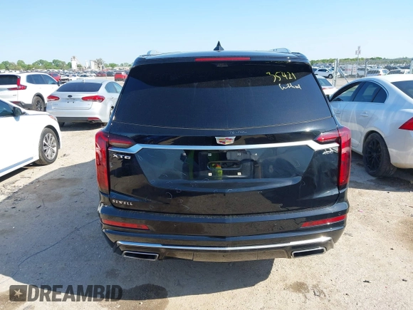 2022 Cadillac XT6 Premium Luxury with VIN 1GYKPCRS3NZ156413, listed as a IAAI auction lot 41952856 with 40,046 mi miles and . Bid and sale history available at DreamBid. Image 16.