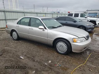 1996 Acura RL Premium with VIN JH4KA9652TC012200, listed as a Copart auction lot 47738615 with 145,330 mi miles and Salvage Title. Bid and sale history available at DreamBid. Image 4.