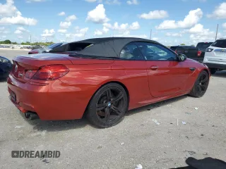 2017 BMW M6 z VIN WBS6G9C53HD932322, wystawiony jako Copart lot #72477344 z przebiegiem 76 325 mil mil oraz Czysty tytuł • Clean title. Historia ofert i sprzedaży dostępna na DreamBid. Obrazek 3.
