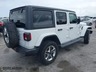 2019 Jeep Wrangler Unlimited Sahara with VIN 1C4HJXEN0KW623325, listed as a IAAI auction lot 42001189 with 1 mi miles. Bid and sale history available at carsss.com. Image 4.