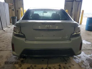 2014 Scion tC z VIN JTKJF5C7XE3071780, wystawiony jako Copart lot #47220975 z przebiegiem 102 630 mil mil oraz Szkody całkowita. Historia ofert i sprzedaży dostępna na DreamBid. Obrazek 6.