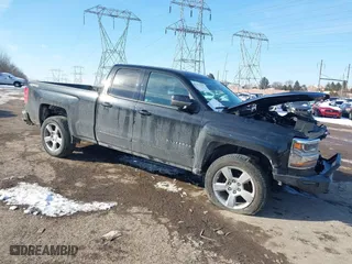 2017 Chevrolet Silverado 1500 LT with VIN 1GCVKREC5HZ285423, listed as a IAAI auction lot 41411392 with 174,759 mi miles. Bid and sale history available at carsss.com. Image 1.