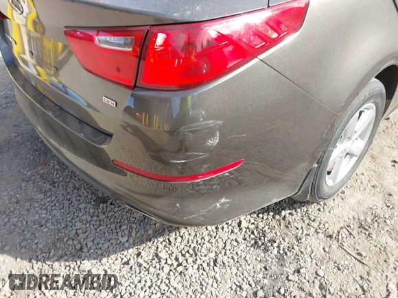 2015 Kia Optima LX with VIN 5XXGM4A77FG353705, listed as a IAAI auction lot 42519873 with 126,066 mi miles and . Bid and sale history available at DreamBid. Image 14.