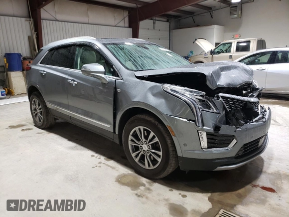 2023 Cadillac XT5 AWD Premium Luxury with VIN 1GYKNDRS5PZ221261, listed as a Copart auction lot 52779565 with 7,098 mi miles and Salvage Title. Bid and sale history available at DreamBid. Image 4.