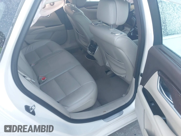 2014 Cadillac XTS Premium with VIN 2G61P5S30E9123057, listed as a IAAI auction lot 41301457 with 123,042 mi miles and . Bid and sale history available at DreamBid. Image 8.