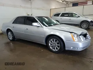 2009 Cadillac DTS 1SC z VIN 1G6KD57YX9U133637, wystawiony jako Copart lot #69585434 z przebiegiem 70 410 mil mil oraz Czysty tytuł • Clean title. Historia ofert i sprzedaży dostępna na DreamBid. Obrazek 4.