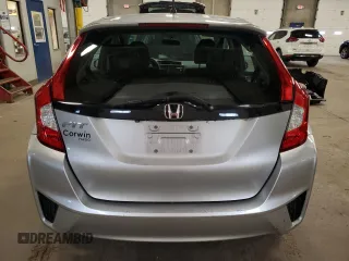 2015 Honda Fit LX с VIN 3HGGK5H56FM720996, выставлен на аукционе Copart как лот 57565945 с пробегом 90 222 миль миль и Списание • Salvage title. История ставок и продаж доступна на DreamBid. Изображение 6.