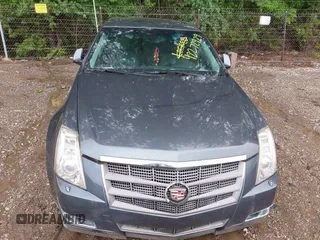 2009 Cadillac CTS AWD z VIN 1G6DT57V790133622, wystawiony jako IAAI lot #42272929 z przebiegiem 124 695 mil mil oraz . Historia ofert i sprzedaży dostępna na DreamBid. Obrazek 6.
