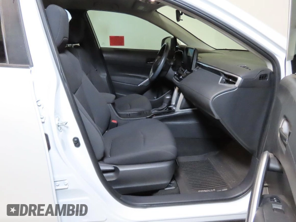 2023 Toyota Corolla Cross LE with VIN 7MUCAAAG2PV052111, listed as a Copart auction lot 64481675 with 18,125 mi miles and Salvage title. Bid and sale history available at DreamBid. Image 5.