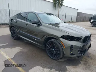 2024 BMW X6 M60i with VIN 5UX43EX06R9U42705, listed as a IAAI auction lot 40359439 with 9,071 mi miles. Bid and sale history available at carsss.com. Image 1.