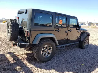 2012 Jeep Wrangler Unlimited Sport with VIN 1C4BJWDGXCL161569, listed as a Copart auction lot 50456355 with 133,703 mi miles and Salvage Title. Bid and sale history available at carsss.com. Image 3.