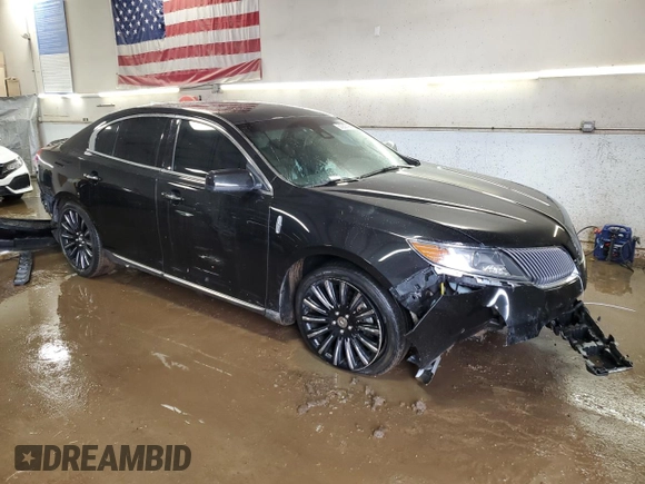 2015 Lincoln MKS with VIN 1LNHL9DK6FG601516, listed as a Copart auction lot 50250795 with 71,103 mi miles and Salvage Title. Bid and sale history available at carsss.com. Image 4.