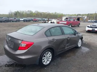 2012 Honda Civic EX-L with VIN 2HGFB2F9XCH505616, listed as a IAAI auction lot 41935511 with 62,298 mi miles and . Bid and sale history available at DreamBid. Image 4.