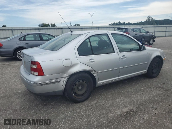 2004 Volkswagen Jetta GL with VIN 3VWRR69M34M108439, listed as a Copart auction lot 74029704 with 296,984 mi miles and Salvage title. Bid and sale history available at DreamBid. Image 3.