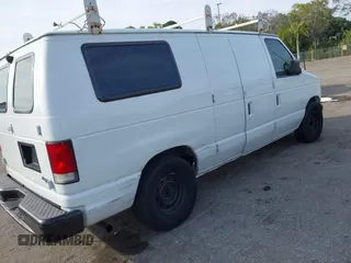 2001 Ford Econoline Cargo with VIN 1FTRE14291HA84414, listed as a IAAI auction lot 41463623 with 192,835 mi miles. Bid and sale history available at carsss.com. Image 6.