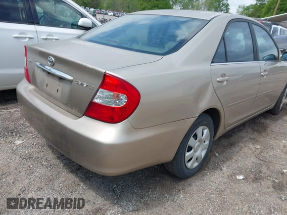 2004 Toyota Camry LE with VIN 4T1BE32K64U265994, listed as a IAAI auction lot 42015312 with 273,408 mi miles. Bid and sale history available at carsss.com. Image 4.