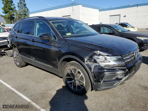 2020 Volkswagen Tiguan SE with VIN 3VV3B7AX2LM105721, listed as a Copart auction lot 79272814 with 59,887 mi miles and Salvage Title. Bid and sale history available at carsss.com. Image 4.