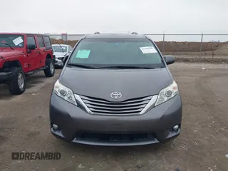 2016 Toyota Sienna XLE with VIN 5TDYK3DC8GS704330, listed as a IAAI auction lot 41586880 with 84,065 mi miles. Bid and sale history available at carsss.com. Image 13.