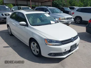 2012 Volkswagen Jetta TDI w/Premium & Nav with VIN 3VWLL7AJ9CM016555, listed as a IAAI auction lot 42298400 with 119,646 mi miles and . Bid and sale history available at DreamBid. Image 1.