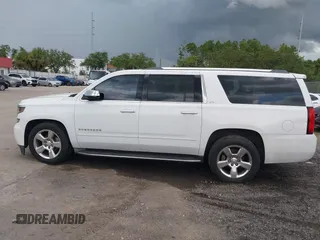 2015 Chevrolet Suburban LTZ with VIN 1GNSCKKC4FR239114, listed as a IAAI auction lot 42832146 with 183,711 mi miles and . Bid and sale history available at DreamBid. Image 14.